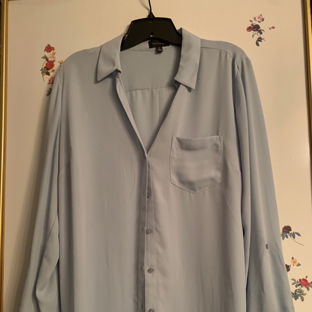 One blue button down shirt